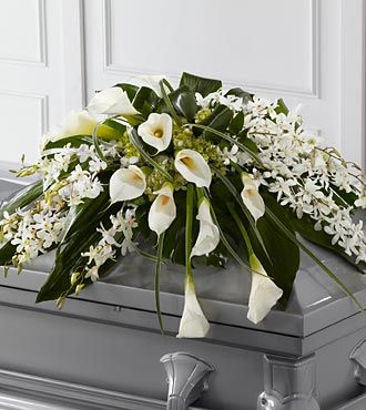 White lilies funeral flower spray
