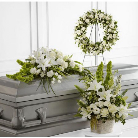 White funeral flowers casket package