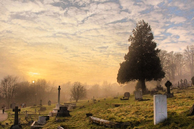 Graveyard at sunset - by Anna-Louise at Pexels